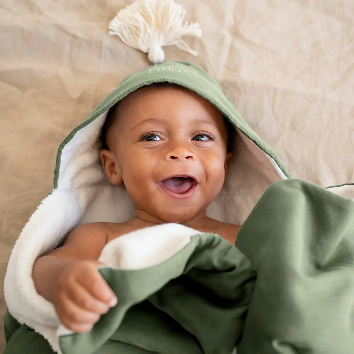 Accessoires bébé et cadeau naissance : cotons lavables, sortie de bain.